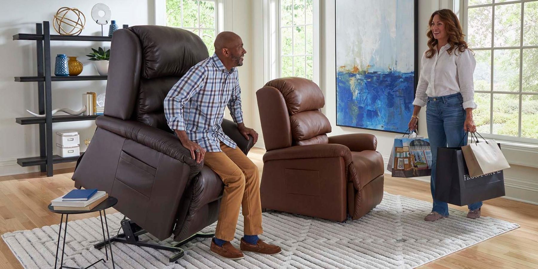 A man rising from a lift recliner in his living room